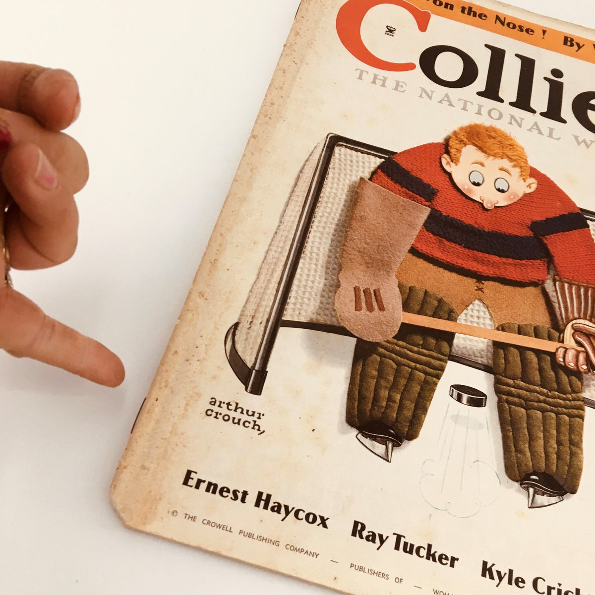 Detailed view of the December 1, 1934 Collier's Magazine cover, showing a cartoonish character and the article 'Europe-On The Nose' by W.B. Courtney.
