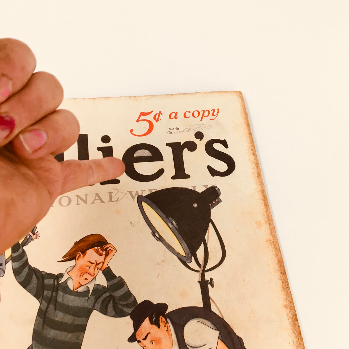 Detailed shot of the top corner of the VTG Collier's Magazine January 19 1935 showcasing the price and title 'Too High & Too Mighty' by Walter Davenport.