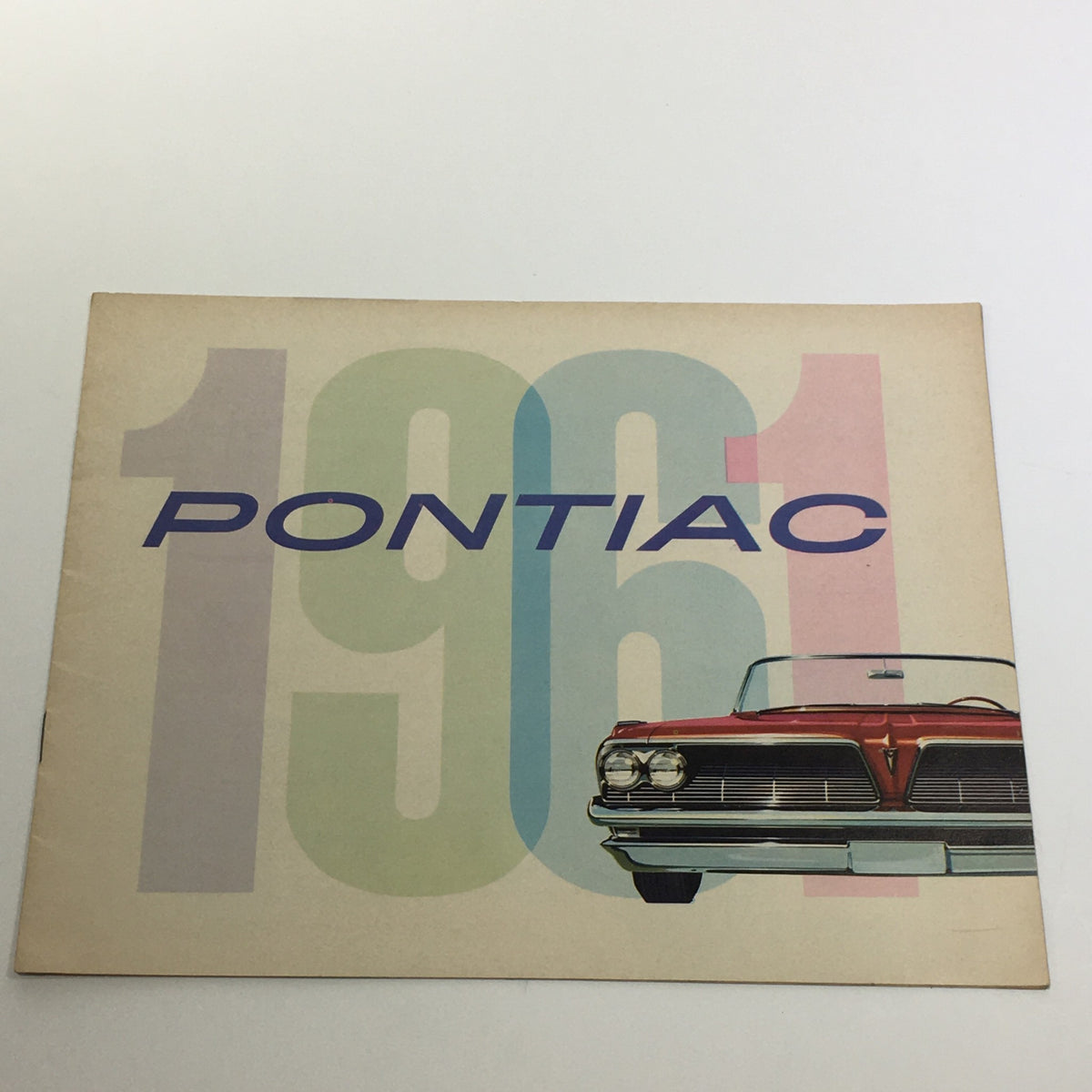 1961 Pontiac Catalina 4-Door Sedan Safety Plate Glass Car Sale Brochure cover featuring the year 1961 and the Pontiac logo.
