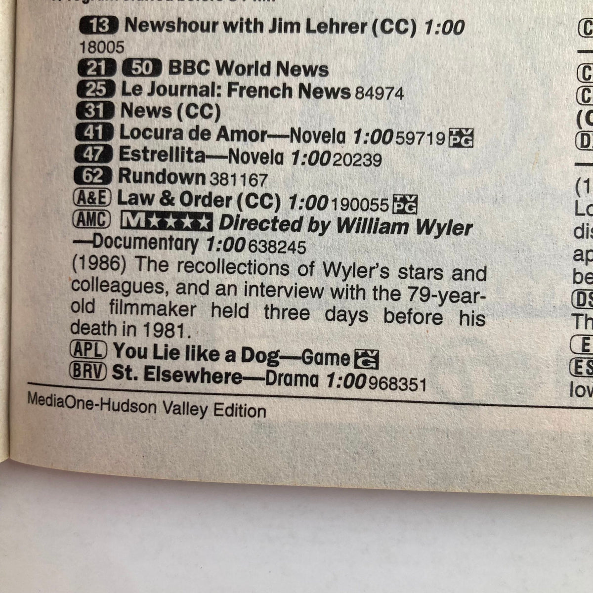 Inside page of TV Guide Magazine January 13 2001 displaying listings, including content related to documentaries and special features, published under MediaOne-Hudson Valley Edition.