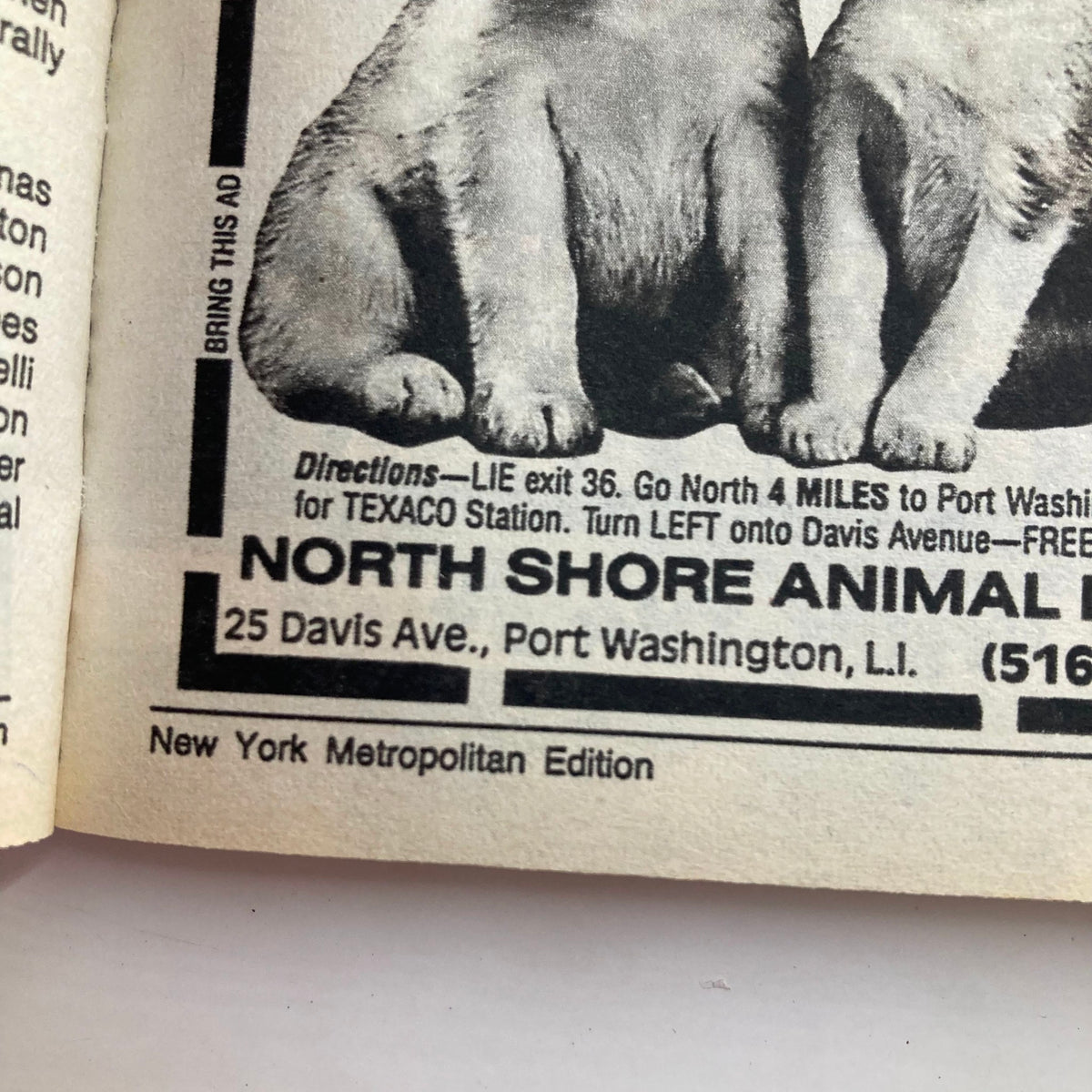 Inside page of the TV Guide Magazine March 11 1989, showcasing an advertisement for North Shore Animal Hospital. The ad features two dogs with clear directions and contact information, reflecting the local New York Metropolitan edition.