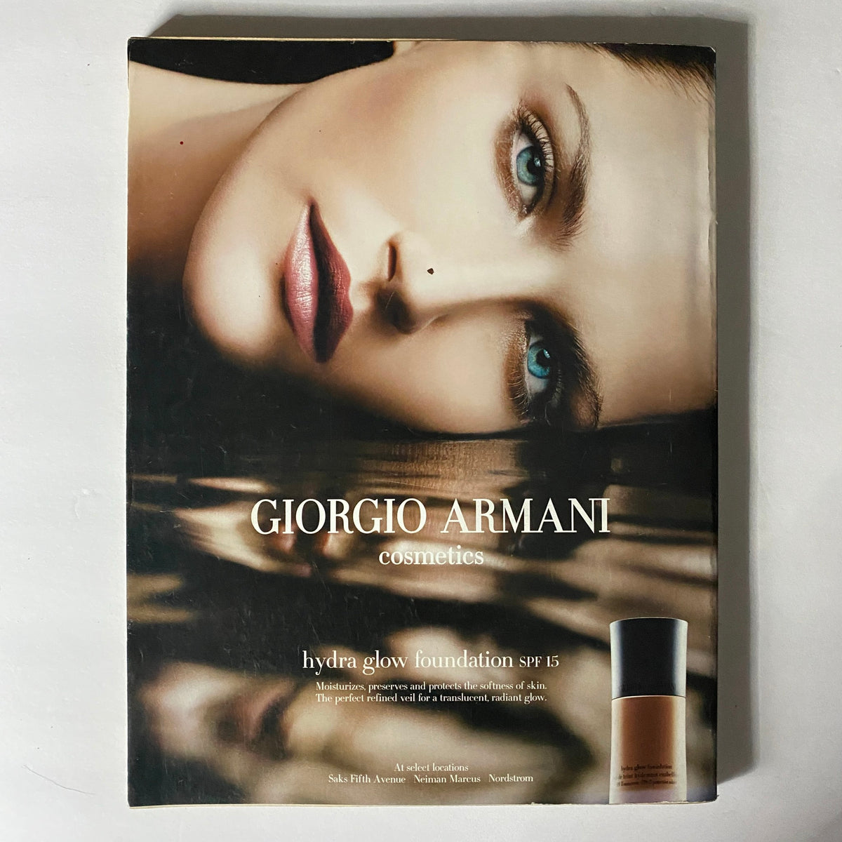 W Magazine April 2005 advertisement for Giorgio Armani's Hydra Glow Foundation SPF 15, highlighting beauty and cosmetics trends of the 2005 celebrity scene.