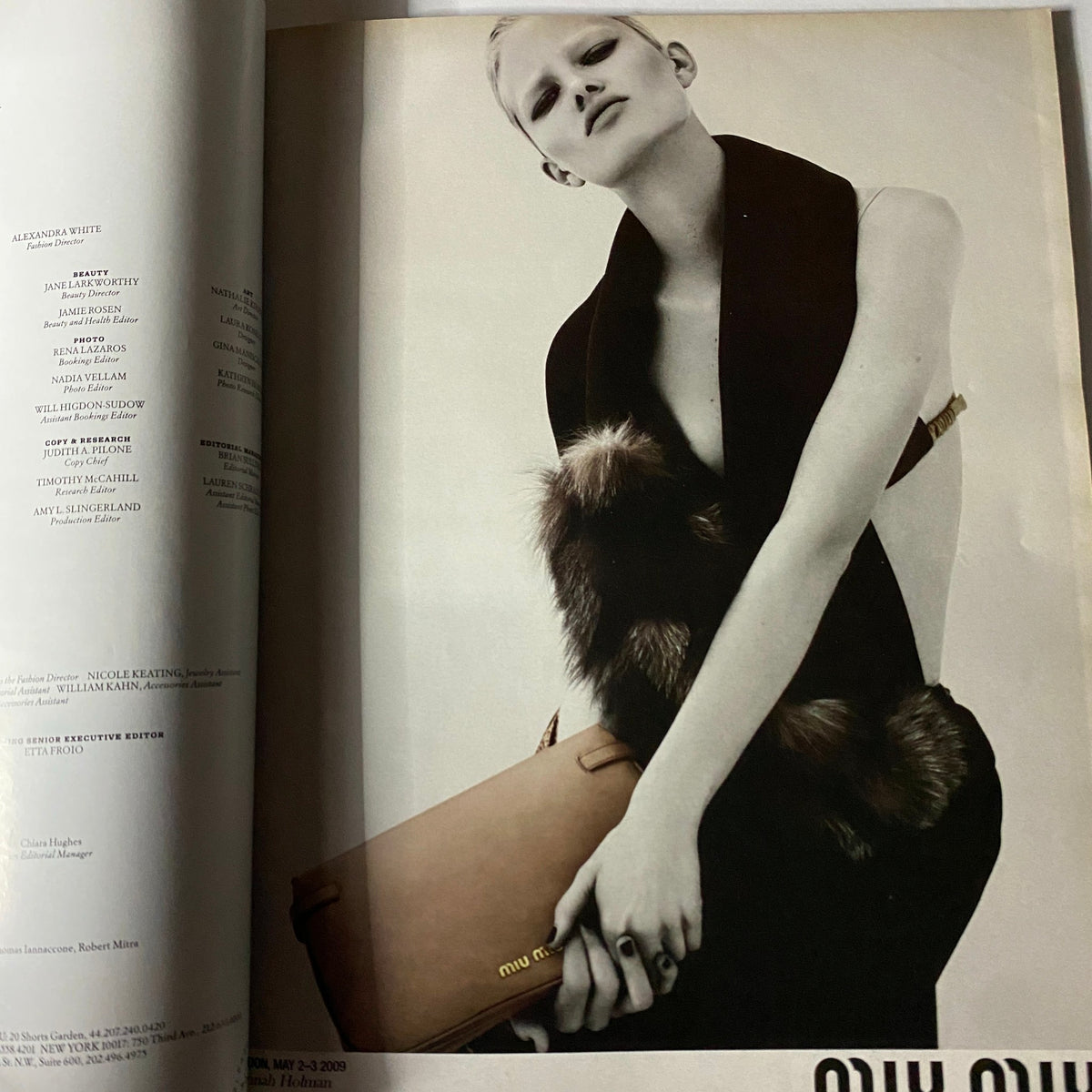 W Magazine August 2009 cover featuring model Lara Stone, showcasing high fashion with a striking pose and minimalist styling.