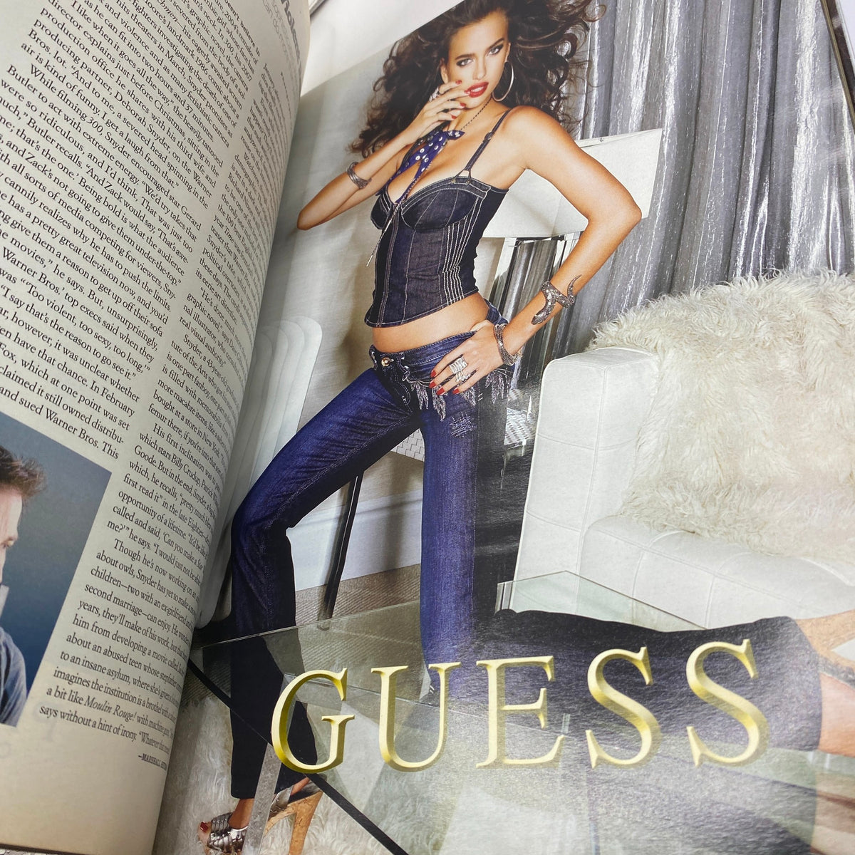 W Magazine March 2009 featuring a model wearing a Guess outfit showcasing a stylish denim look, reflecting the fashion trends of the late 2000s.