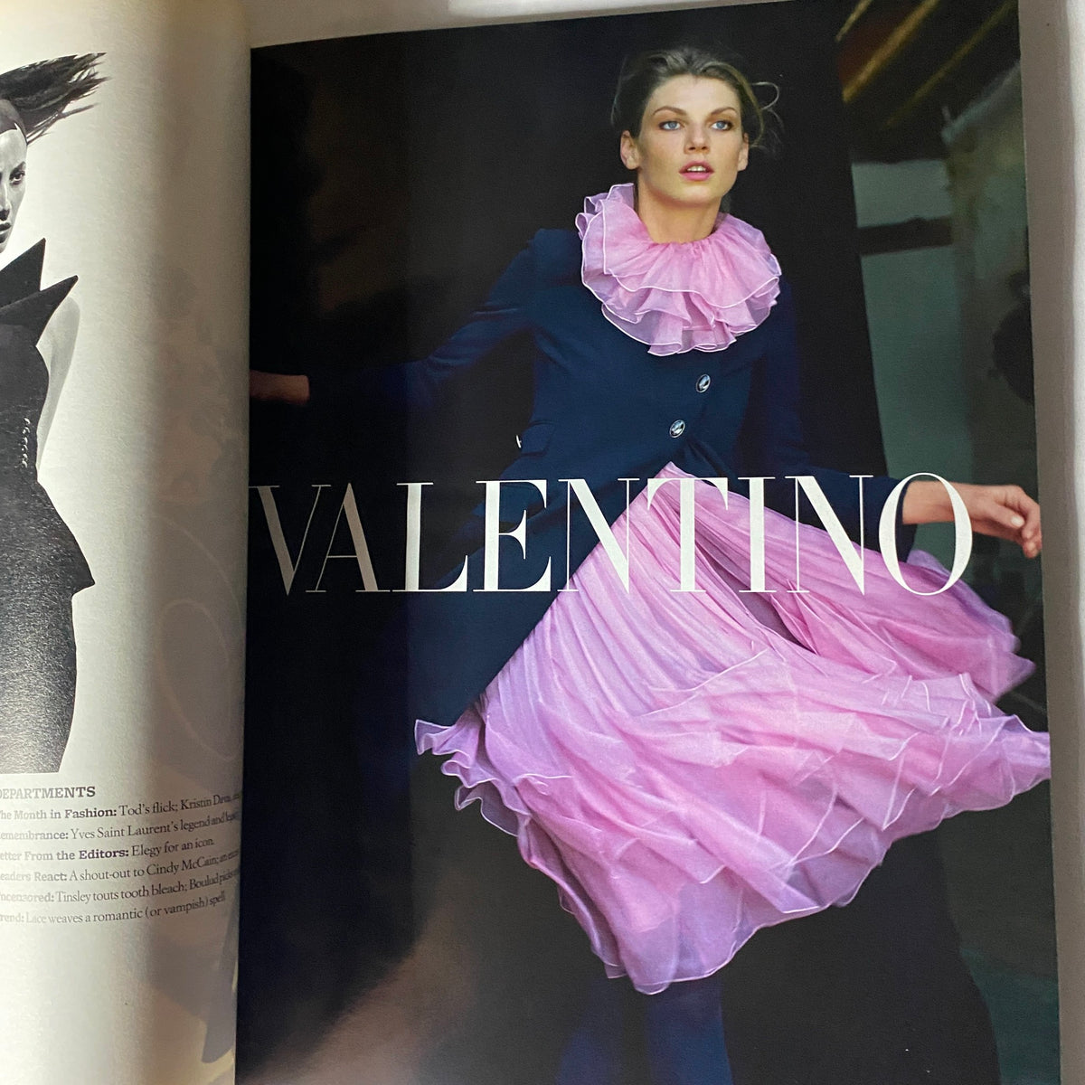 W Magazine August 2008 features a stunning editorial spread showcasing Valentino fashion, highlighting dress designs with playful elements, enhancing the magazine's representation of contemporary style.