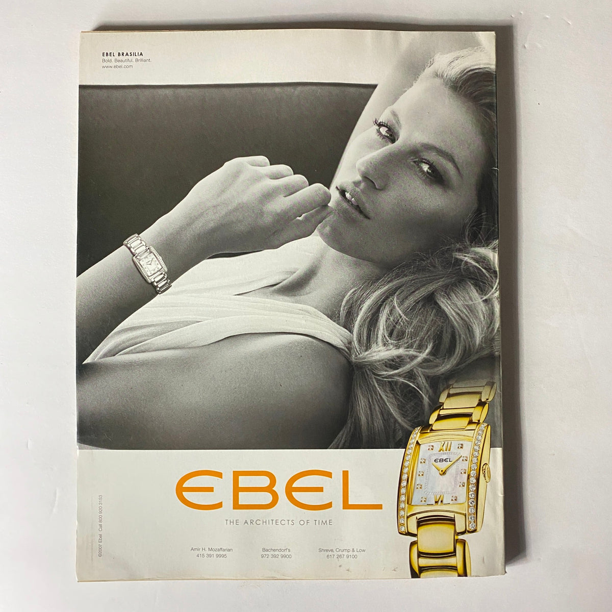 Advertisement from W Magazine May 2007 featuring a glamorous model wearing a diamond-studded Ebel watch, emphasizing luxury and elegance.