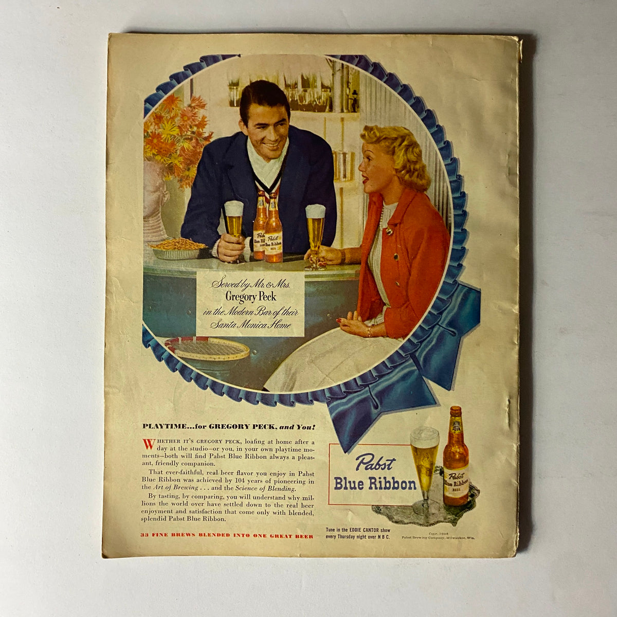 Back cover of Sport Magazine April 1948 featuring an advertisement for Pabst Blue Ribbon beer, illustrating a social scene with Gregory Peck.