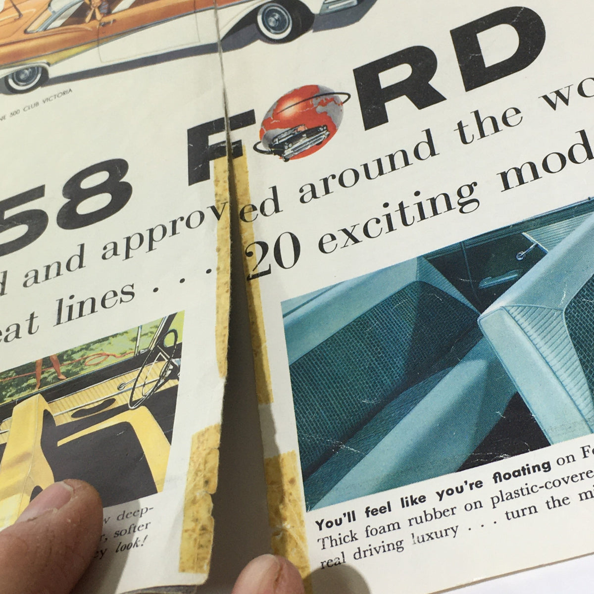 Close-up view of the 1958 Ford Thunderbird & Skyliner Wagon Series V-8 Engine Car Catalog Brochure showing the spine and minor wear details.