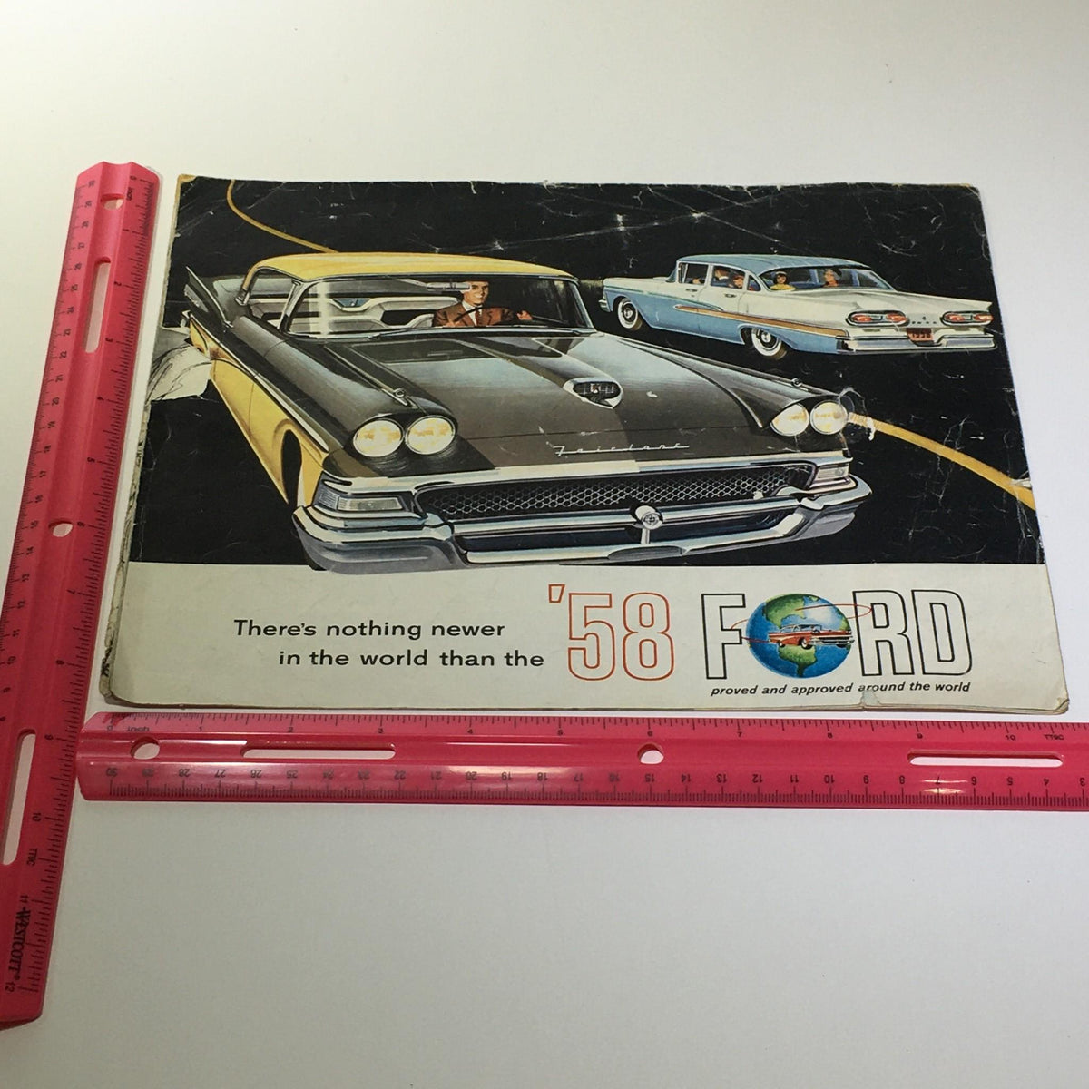 1958 Ford Thunderbird & Skyliner Wagon Series V-8 Engine Car Catalog Brochure showcasing a classic car design with vintage styling, highlighting Ford's iconic automobiles.