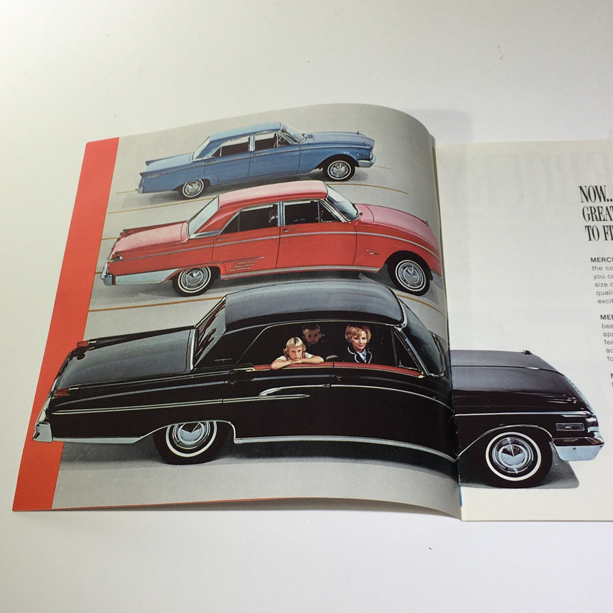 Inside page of the 1962 Mercury's Comet Meteor Monterey V-8 Engine 2-Barrel Carburetor Car Catalog featuring illustrations of classic Mercury cars with people.