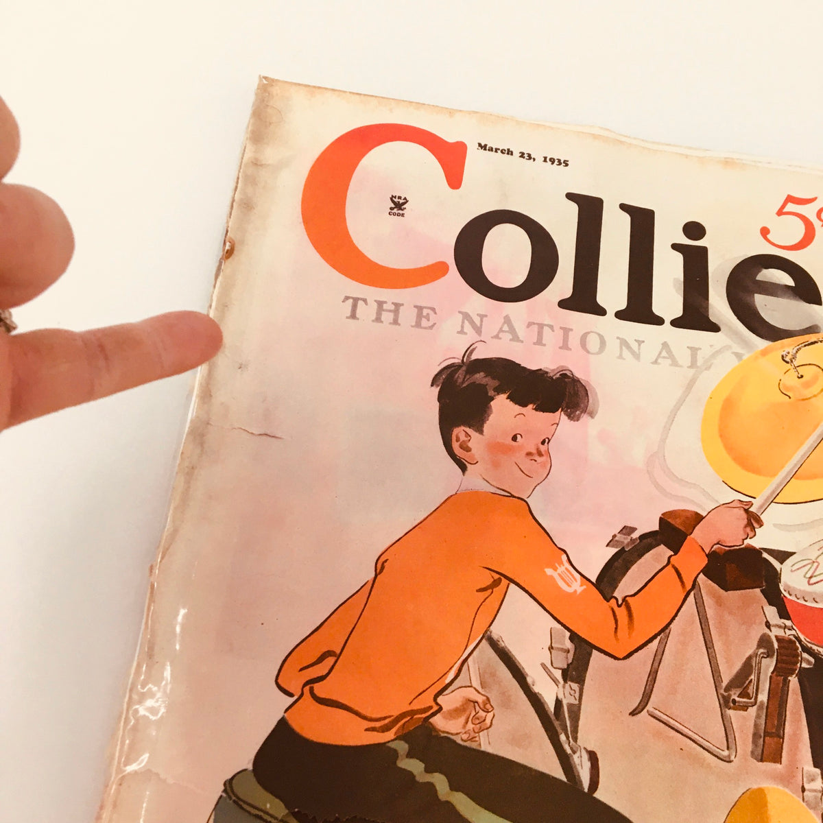 Close-up of the Collier's Magazine cover from March 23, 1935 showing 'The Dance Shanghai Love Story' by Pearl Buck, highlighting the joyful expression of a boy playing musical instruments.