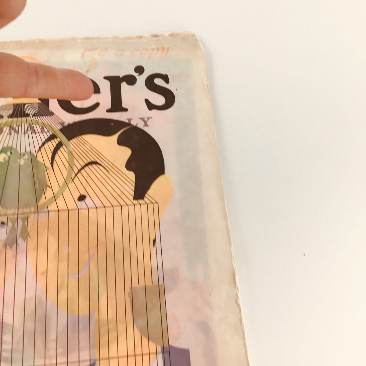 Another angle of the VTG Collier's Magazine June 13, 1936, highlighting the bird cage cover art by George De Zayas, with signs of aging.