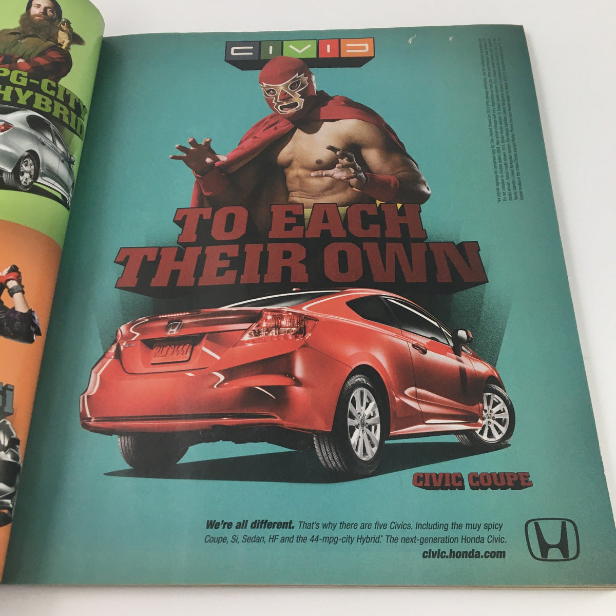 Game Informer Magazine July 2011 Issue 219 featuring a colorful advertisement for the Honda Civic Coupe with the slogan 'To Each Their Own' showcasing a unique character design.