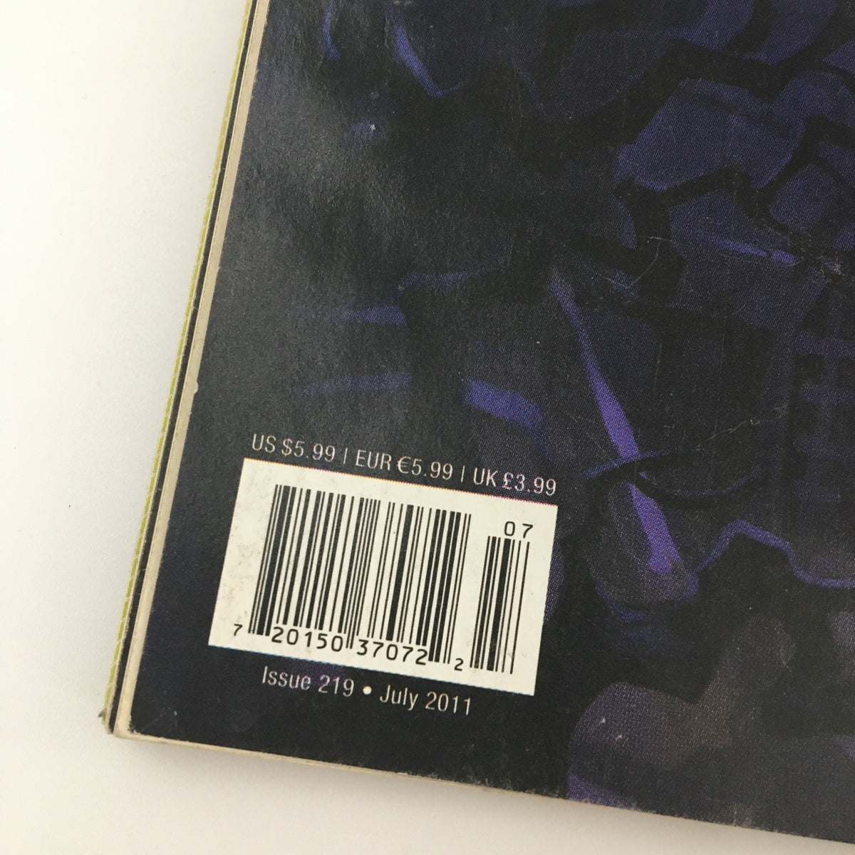 Barcode detail from Game Informer Magazine July 2011 Issue 219 Darksiders II Video Game Guide, highlighting the pricing and issue information.