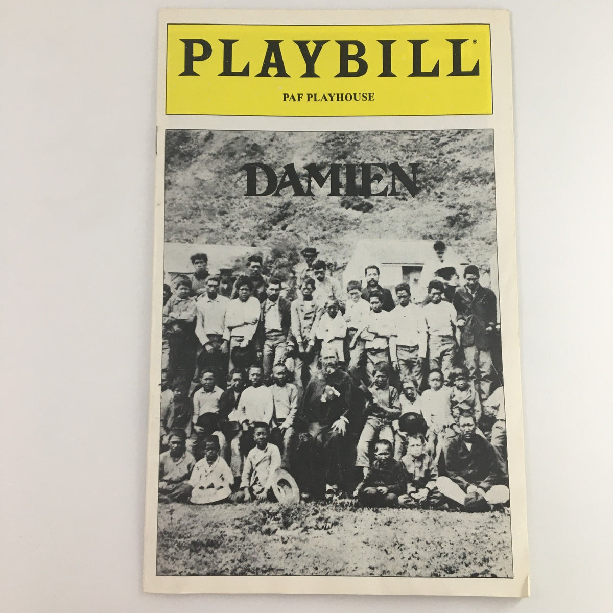 1979 Playbill PAF Playhouse featuring the play Damien, showcasing actors and attendees from the performance. This vintage promotional piece highlights theater history.