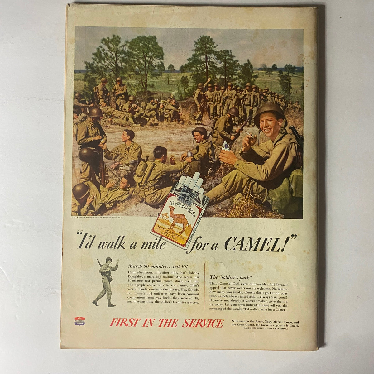 Back cover of Life Magazine from October 2, 1944, featuring a vintage advertisement for Camel cigarettes, depicting soldiers during World War II.