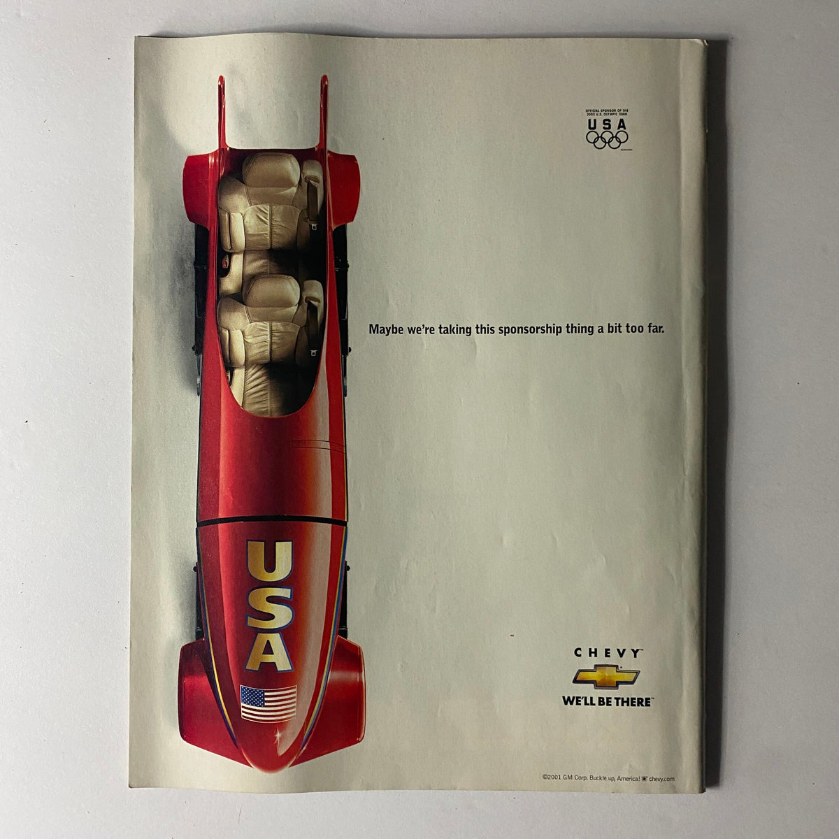 Sports Illustrated February 18, 2002 LeBron James Cover advertising a Chevy sponsorship with an Olympic theme, symbolizing sports marketing in the early 2000s.