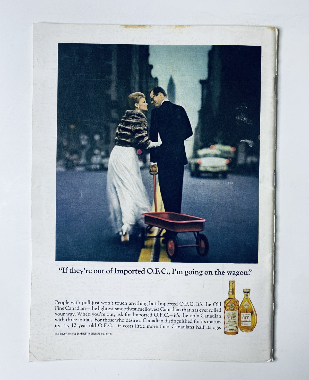 Back cover of The New Yorker Magazine July 3, 1965 featuring a vintage advertisement for Imported O.F.C. whiskey, showcasing a couple in fashionable attire on a city street.