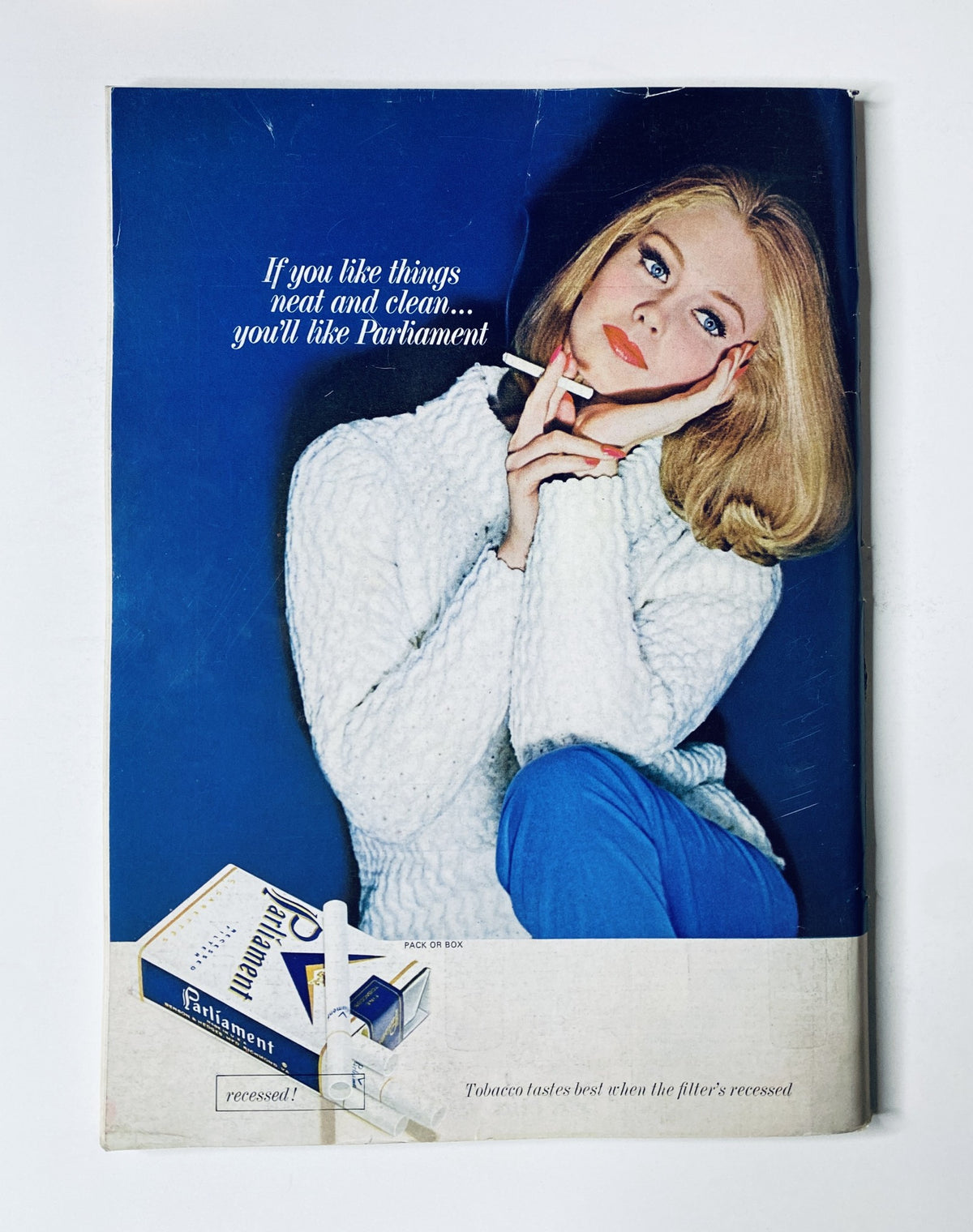 Back cover of The New Yorker Magazine from October 31, 1964 displaying an advertisement for Parliament cigarettes with a model promoting cleanliness.