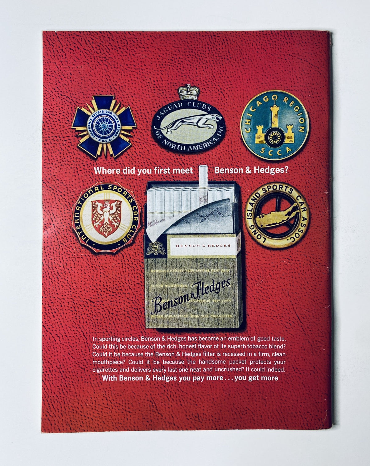 Advertisement in The New Yorker Magazine September 5, 1964 for Benson & Hedges, displaying various sporting emblems on a red background, highlighting brand prestige and quality.