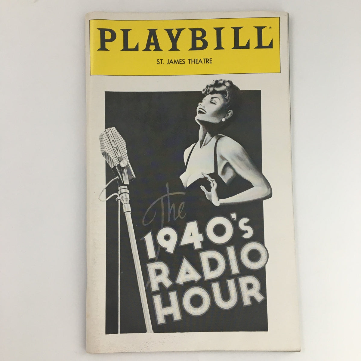 1979 Playbill for The 1940's Radio Hour musical at St. James Theatre featuring a vintage design and a classic microphone, showcasing the charm of 1940s entertainment.