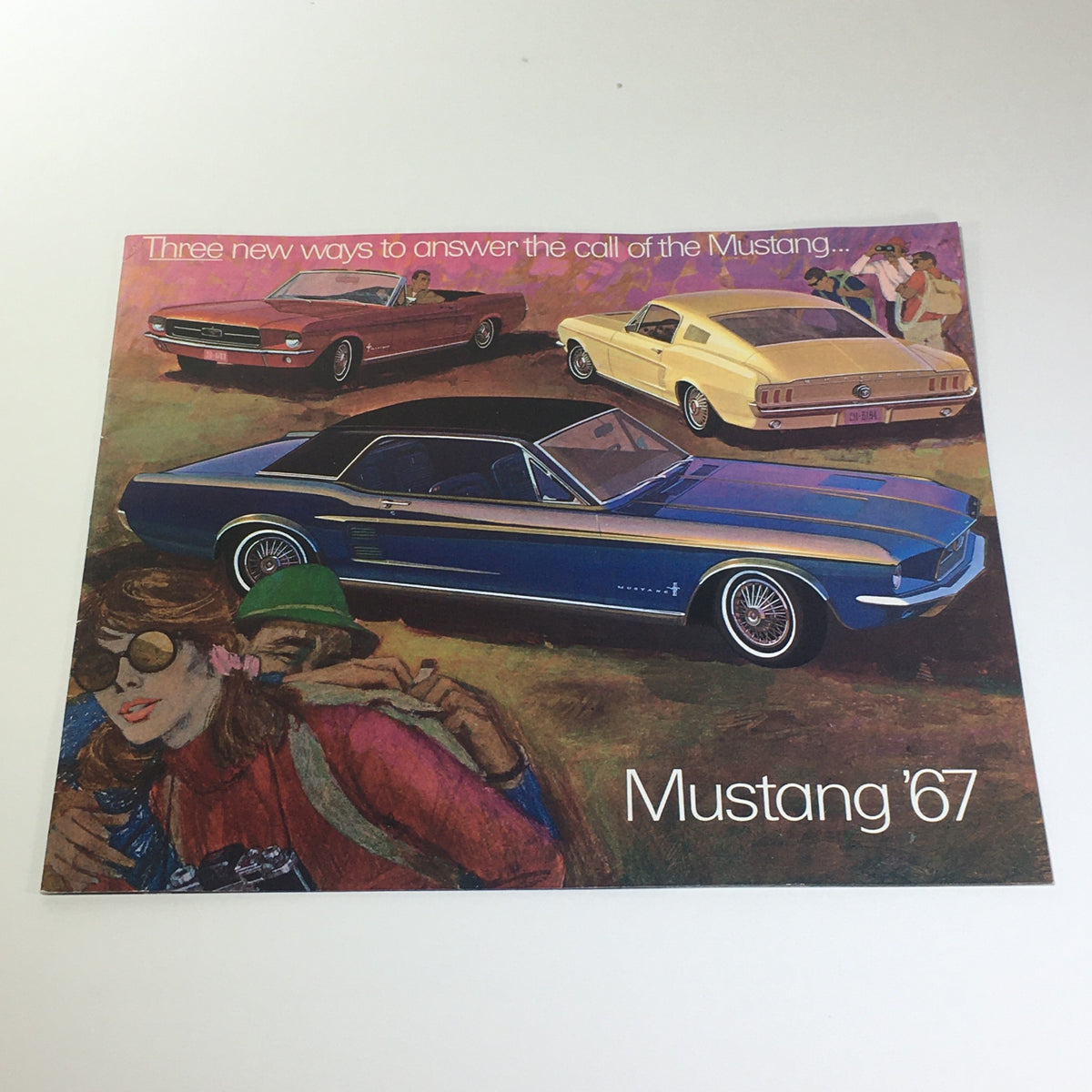 1967 Mustang 2-Door Sedan Special V-8 Engine 320HP brochure cover featuring vibrant illustrations of vintage Mustangs