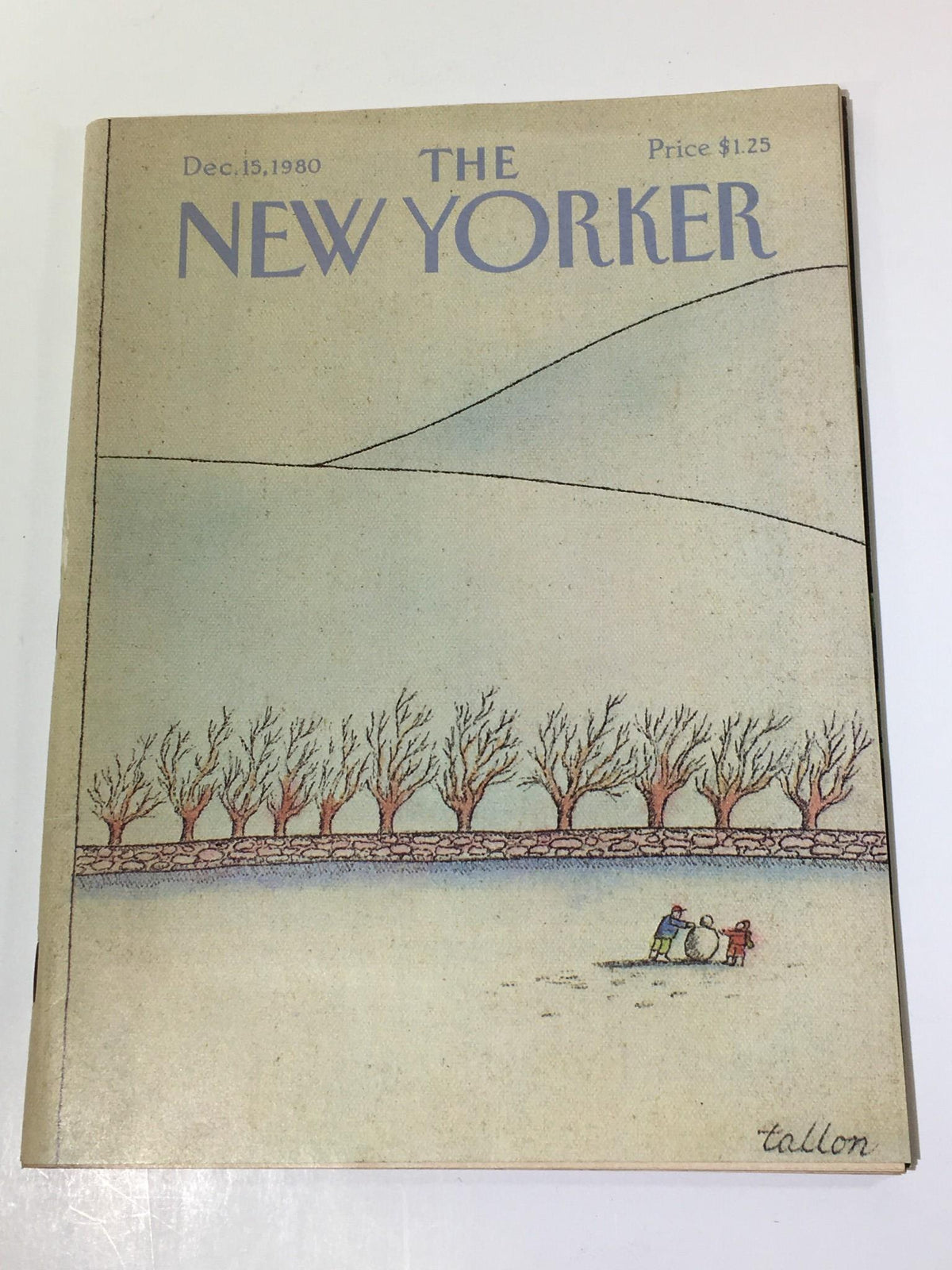 The New Yorker December 15 1980 Full Magazine Cover featuring a whimsical winter scene with children building a snowman, designed by artist Robert Tallon. This vintage magazine showcases the unique artistry and cultural commentary emblematic of its era.