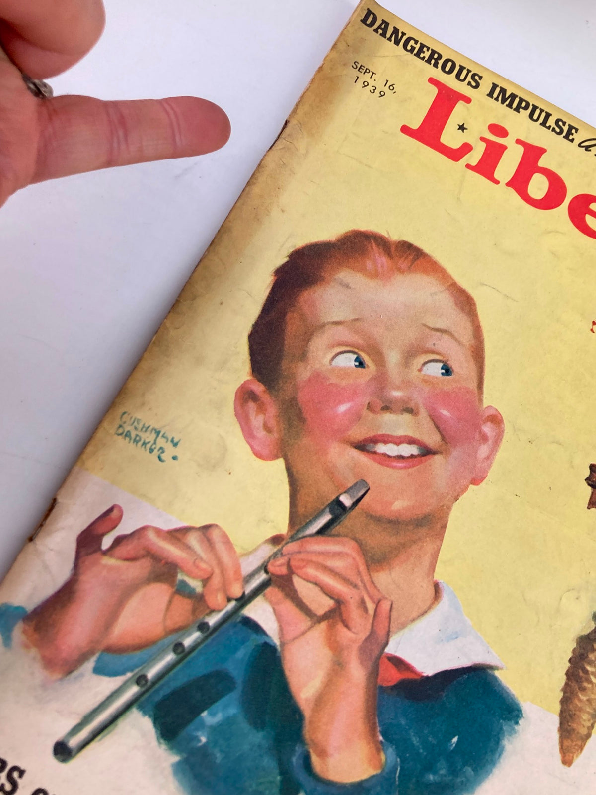 Close-up of the VTG Liberty Magazine September 16 1939 cover showcasing the boy with a flute, emphasizing the magazine's nostalgic artwork and date.