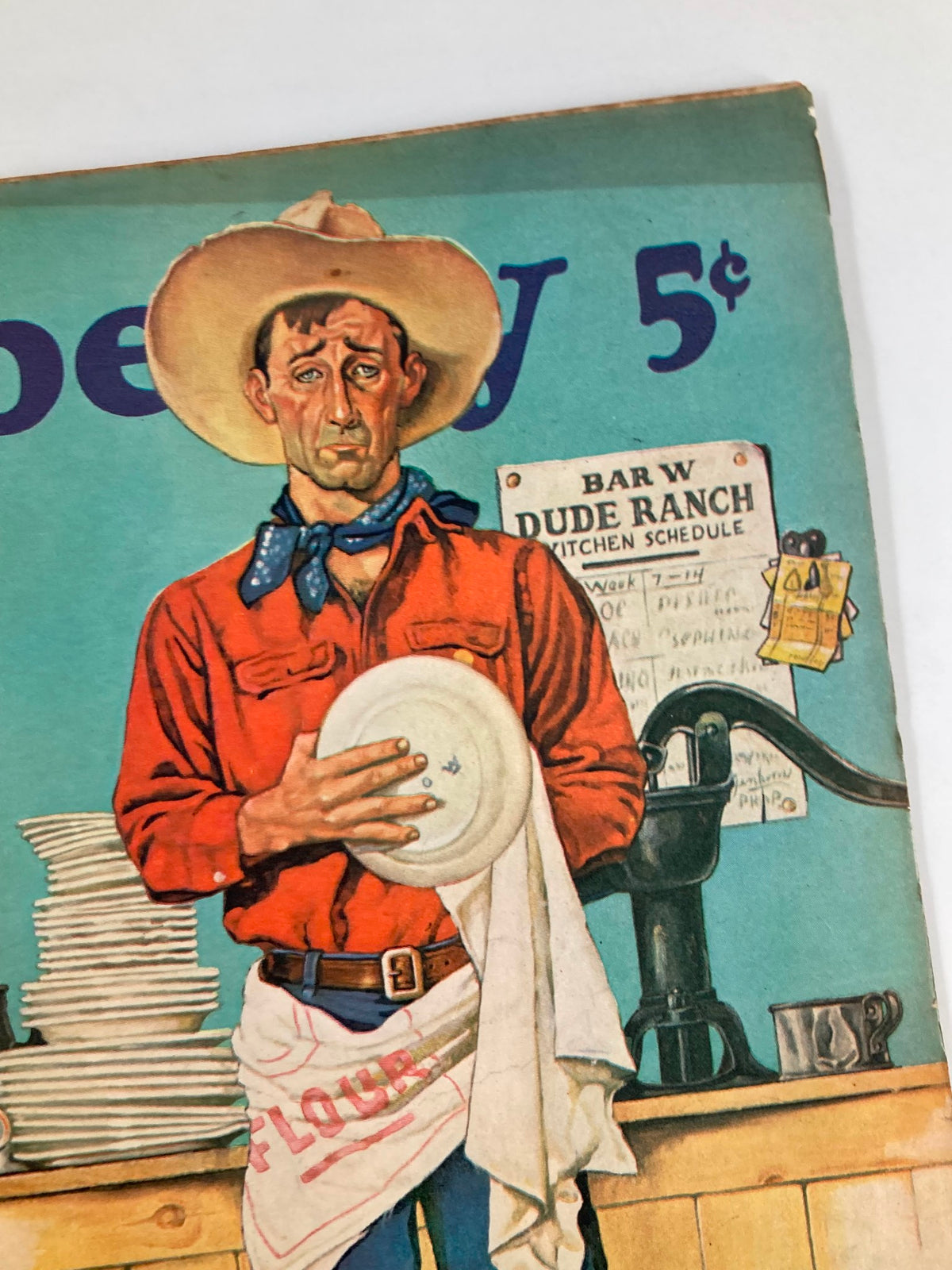 Detailed view of the VTG Liberty Magazine August 5, 1939 cover showing the cowboy character, with kitchen items in the background.