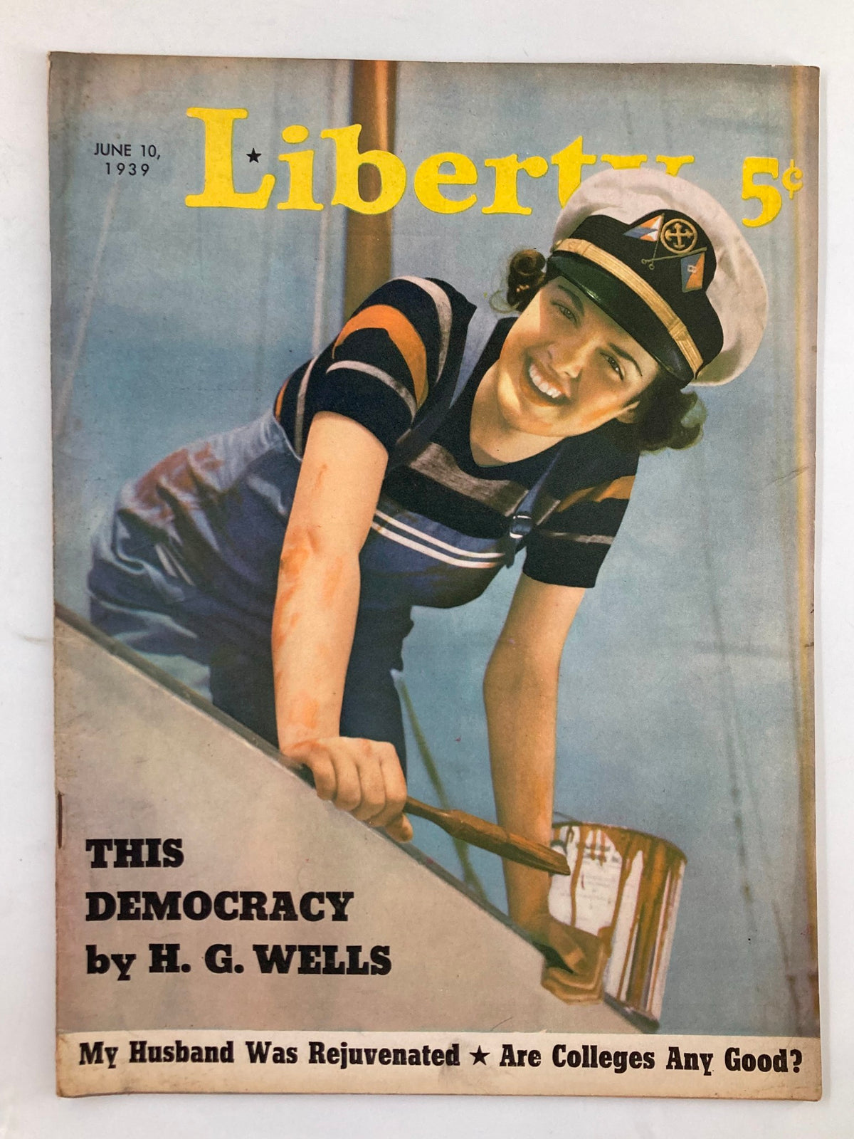 Cover of VTG Liberty Magazine June 10, 1939 featuring the article 'This Democracy' by H. G. Wells, showcasing a smiling woman in a sailor hat, representing the vintage style of the era.
