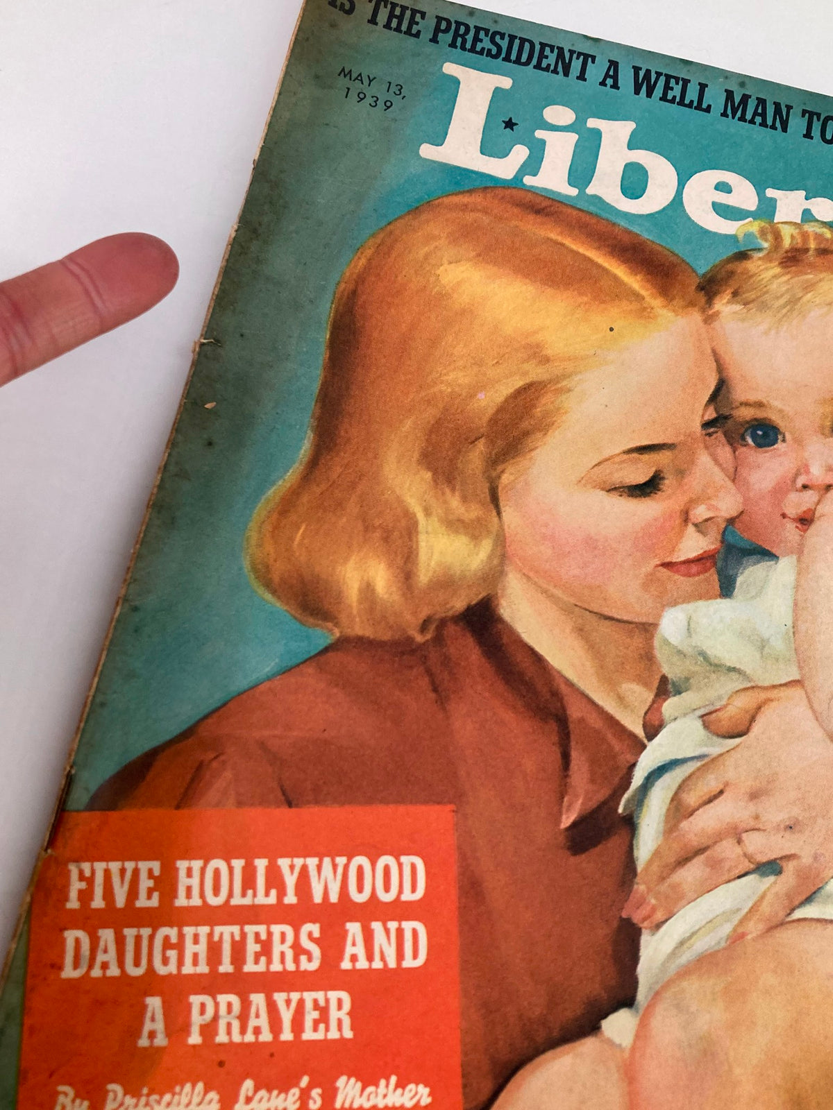 Close-up view of the VTG Liberty Magazine May 13 1939 cover, highlighting the mother and child with a focus on the title 'Five Hollywood Daughters and a Prayer'.