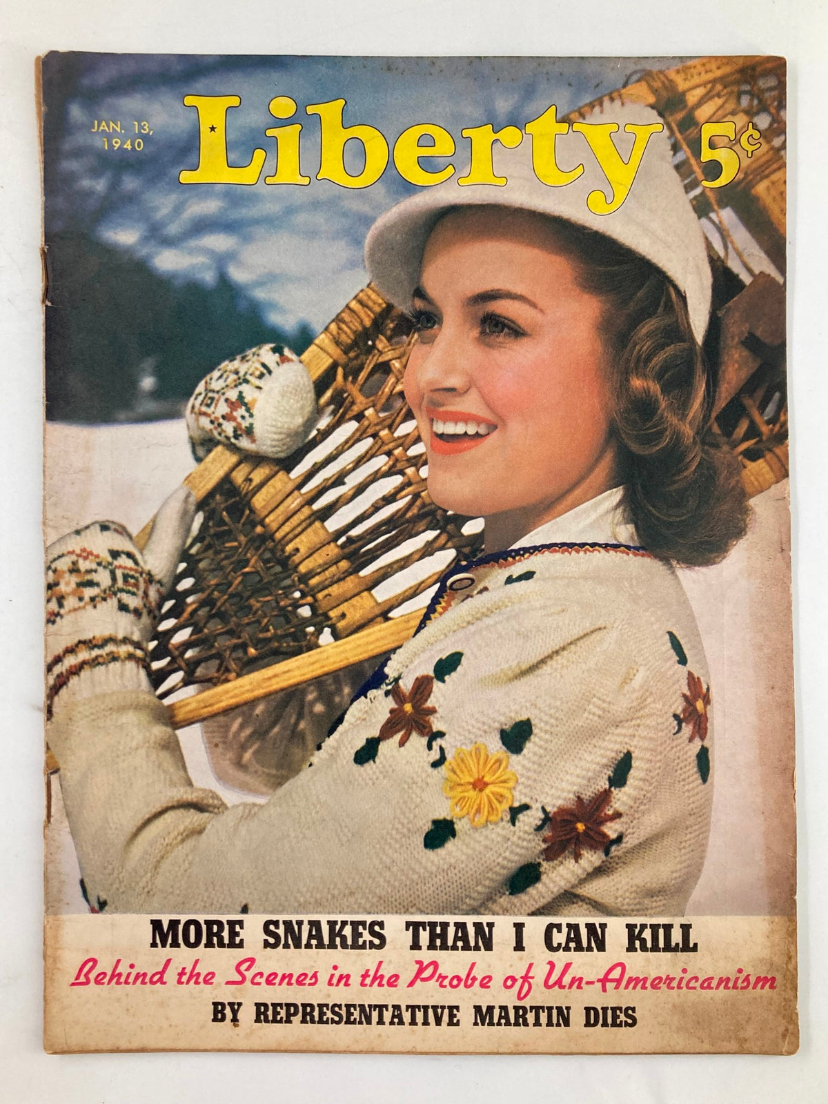Cover of VTG Liberty Magazine January 13 1940 featuring the article 'More Snakes Than I Can Kill' with an image of a woman in winter attire smiling and holding a sled.