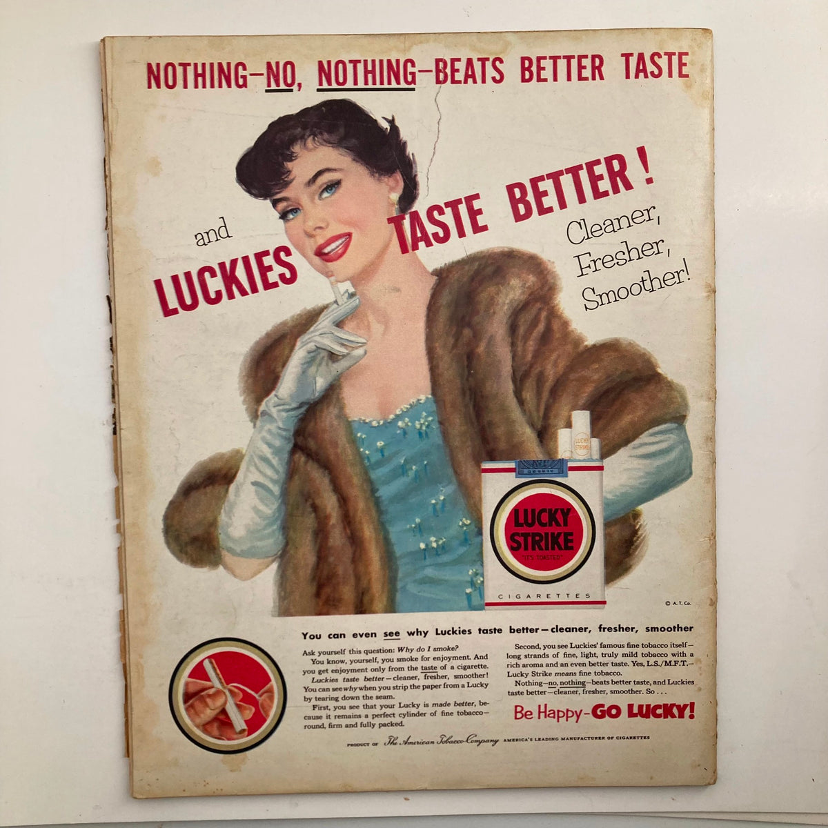 Cover of Look Magazine, April 7, 1953, highlighting a vintage advertisement for Lucky Strike cigarettes with a glamorous model.