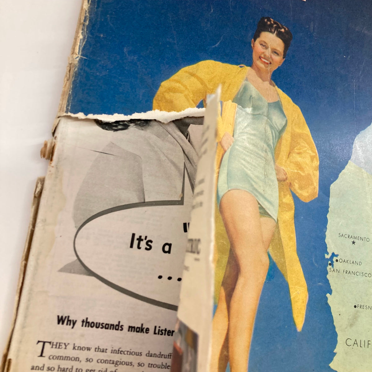 Side view of VTG Look Magazine May 27, 1947 showcasing the magazine cover with a woman in a swimsuit and the title 'Our Growing West' partially visible.