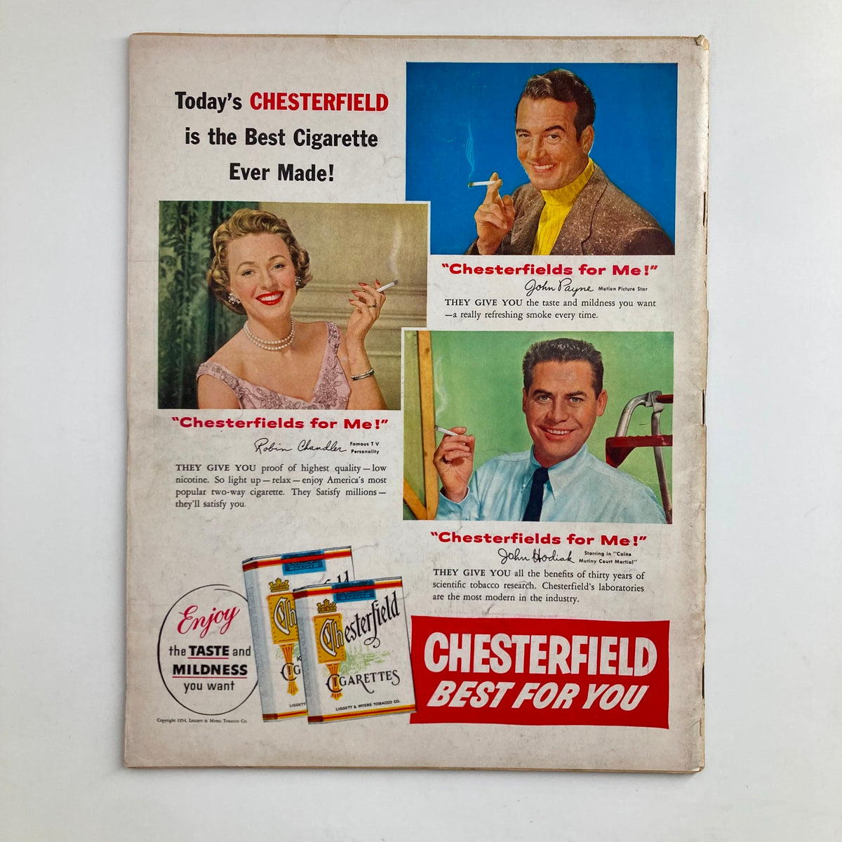 Back cover of VTG Look Magazine July 13, 1954, featuring a vintage Chesterfield cigarette advertisement with colorful images and slogans promoting the brand.