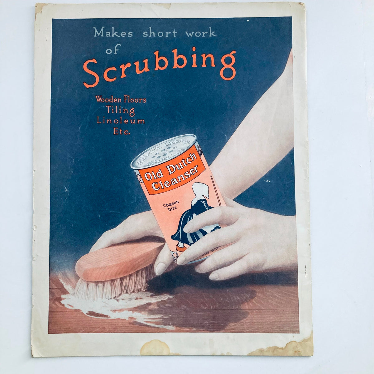 An advertisement from The Saturday Evening Post Magazine January 29, 1916 promoting Old Dutch Cleanser for scrubbing wooden floors and other surfaces.
