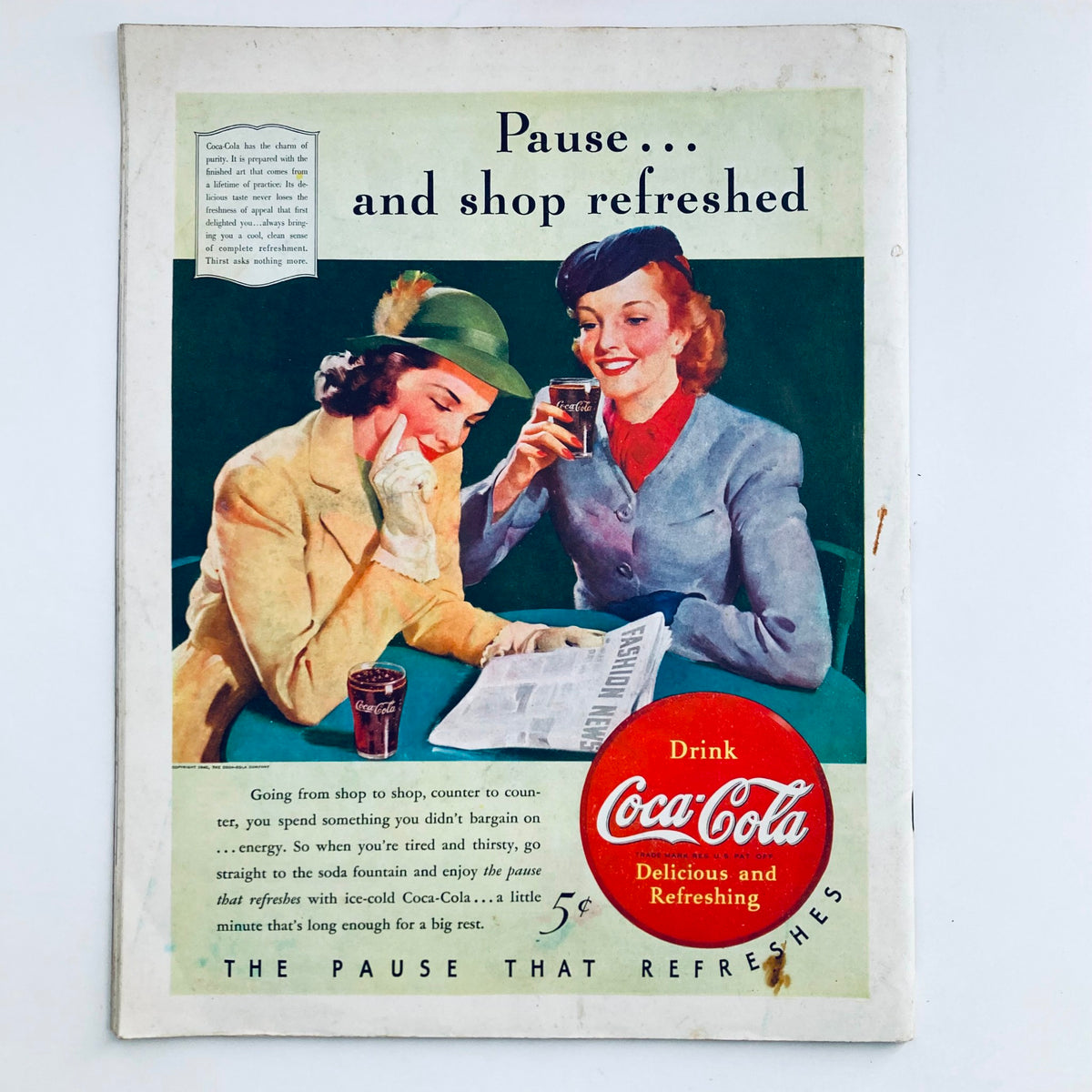 Back cover of The Saturday Evening Post Magazine, September 21, 1940 displaying an advertisement for Coca-Cola, promoting a refreshing pause while shopping.