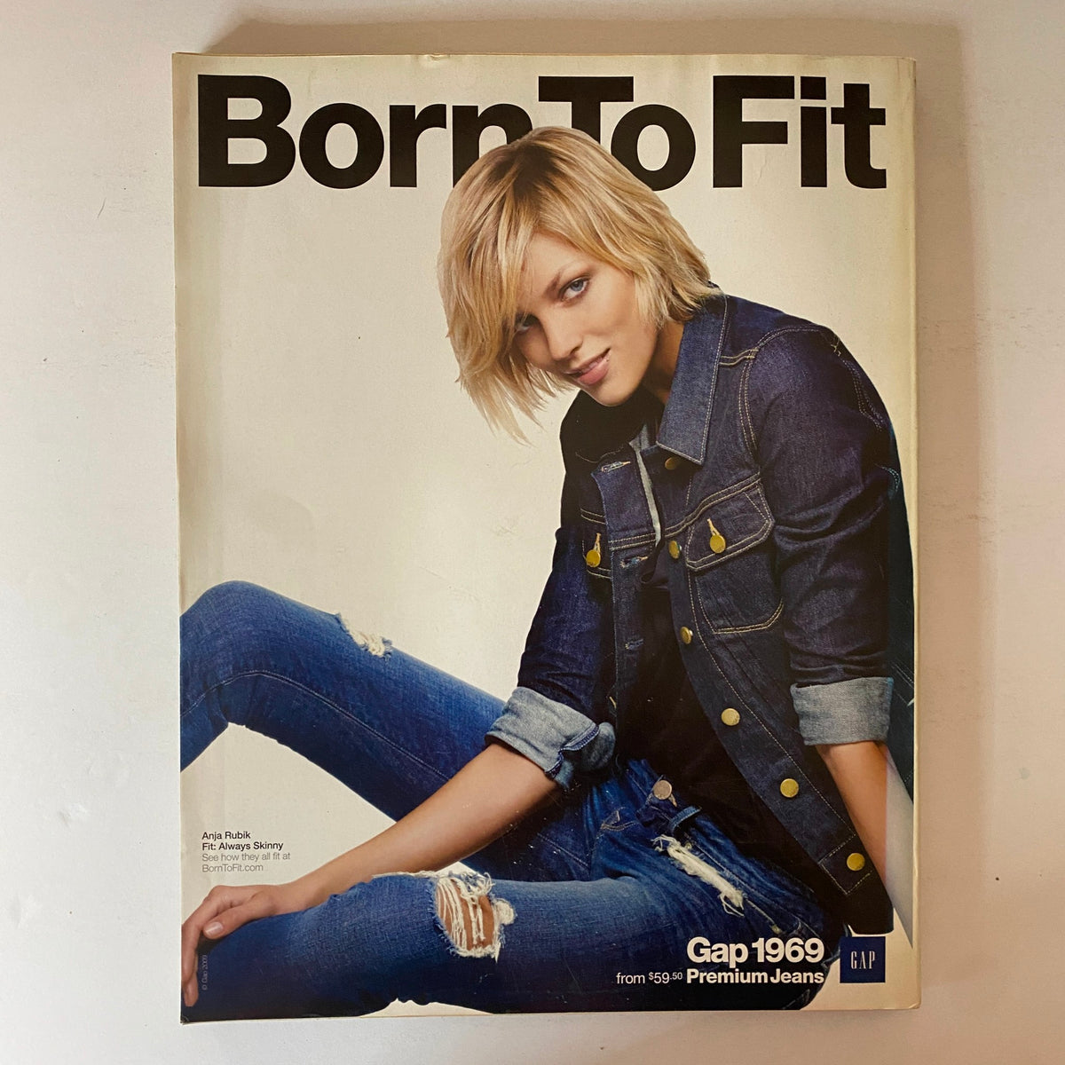 Gap 1969 advertisement from W Magazine September 2009 featuring a model in a denim jacket, promoting Premium Jeans in a stylish layout.