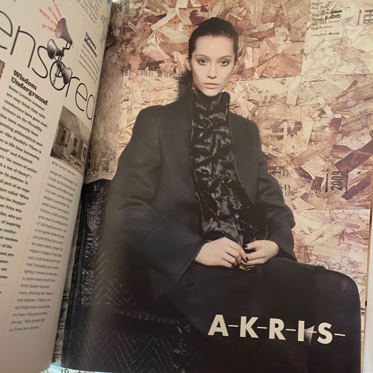 A striking fashion editorial spread from W Magazine October 2009 featuring a model in an Akris outfit, showcasing the elegance and sophistication in contemporary fashion.