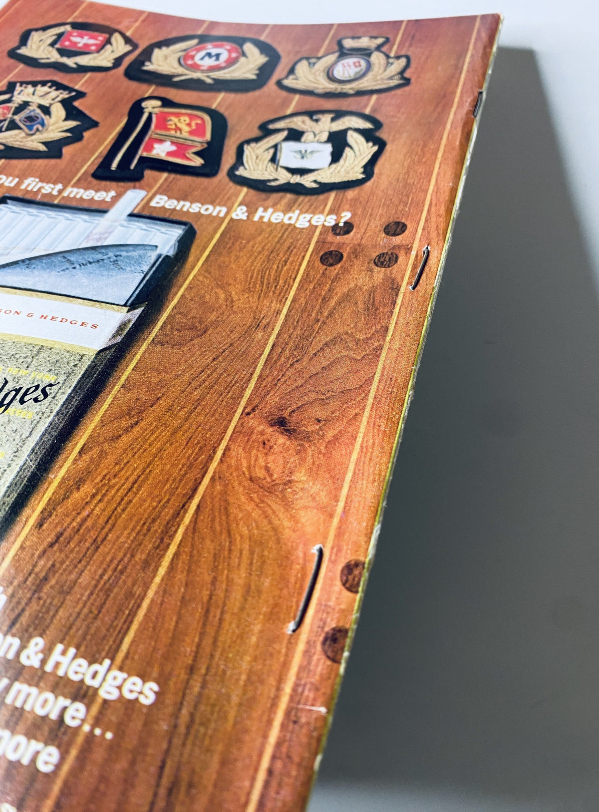 Perimeter view of the spine of The New Yorker magazine July 11, 1964, showing signs of wear and tear on the edges.
