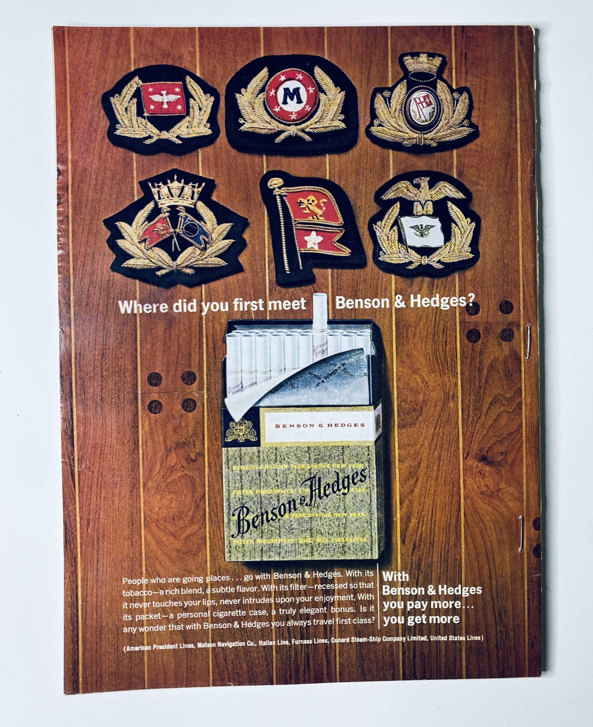 Back cover of The New Yorker magazine July 11, 1964, displaying an advertisement for Benson & Hedges featuring military insignia.