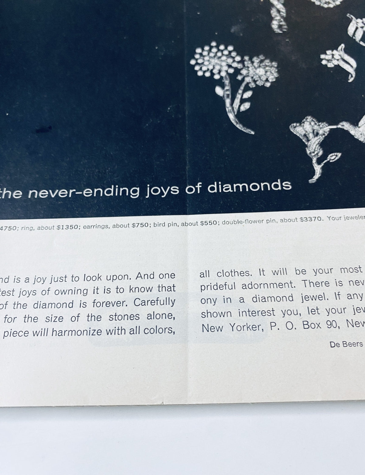 Close-up of an advertisement in The New Yorker Magazine May 2, 1964 promoting De Beers diamonds, emphasizing the timeless joy of owning diamond jewelry.