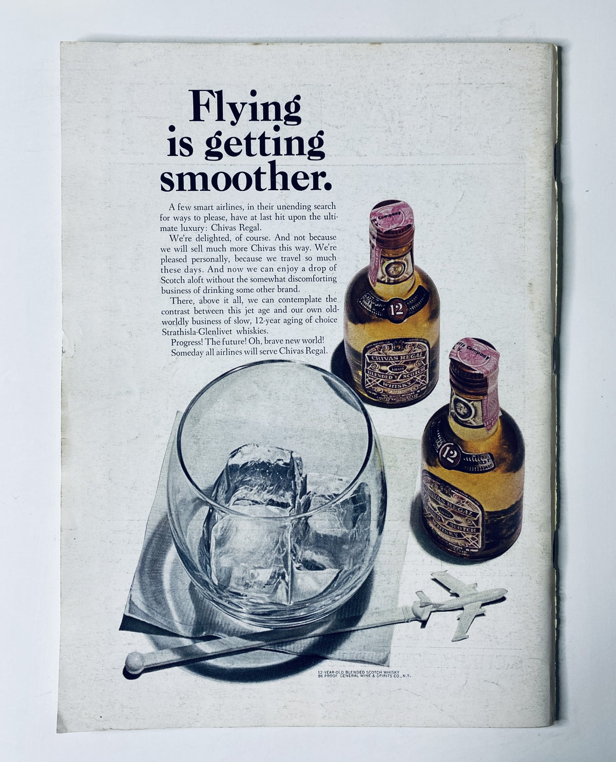 Advertisement featuring whiskey and ice in a glass from The New Yorker Magazine June 26, 1965, promoting smoother flying experiences, highlighting original graphics and design elements of the era.