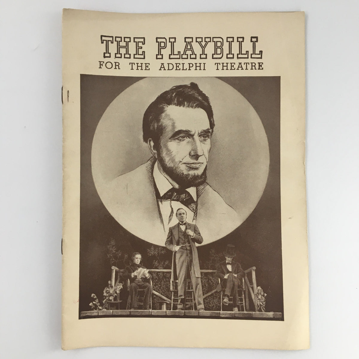 1939 Playbill for the Adelphi Theatre featuring 'Abe Lincoln in Illinois' with a prominent portrait of Abraham Lincoln and Richard Gaines performing on stage.