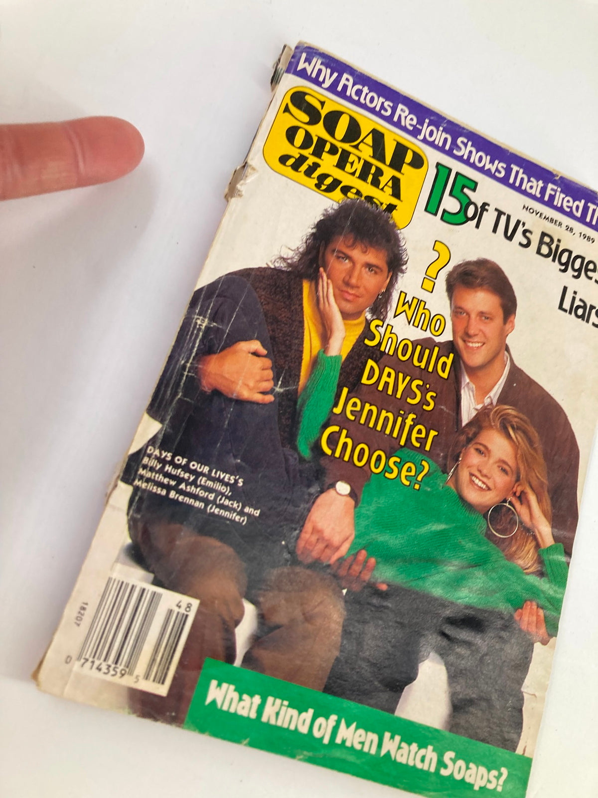 Close-up view of the cover of VTG Soap Opera Digest November 28 1989 showing the main cast, Bill Hufsey, Matthew Ashford, and Melissa Brennan, discussing who Jennifer should choose on the show.