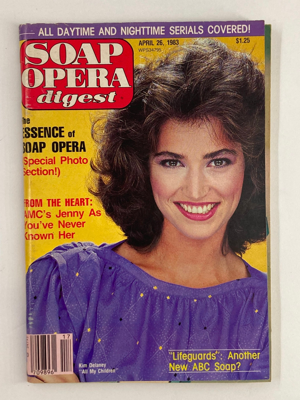 VTG Soap Opera Digest cover from April 26, 1983, featuring Kim Delaney from All My Children, showcasing her smiling with voluminous hair, dressed in a purple top.