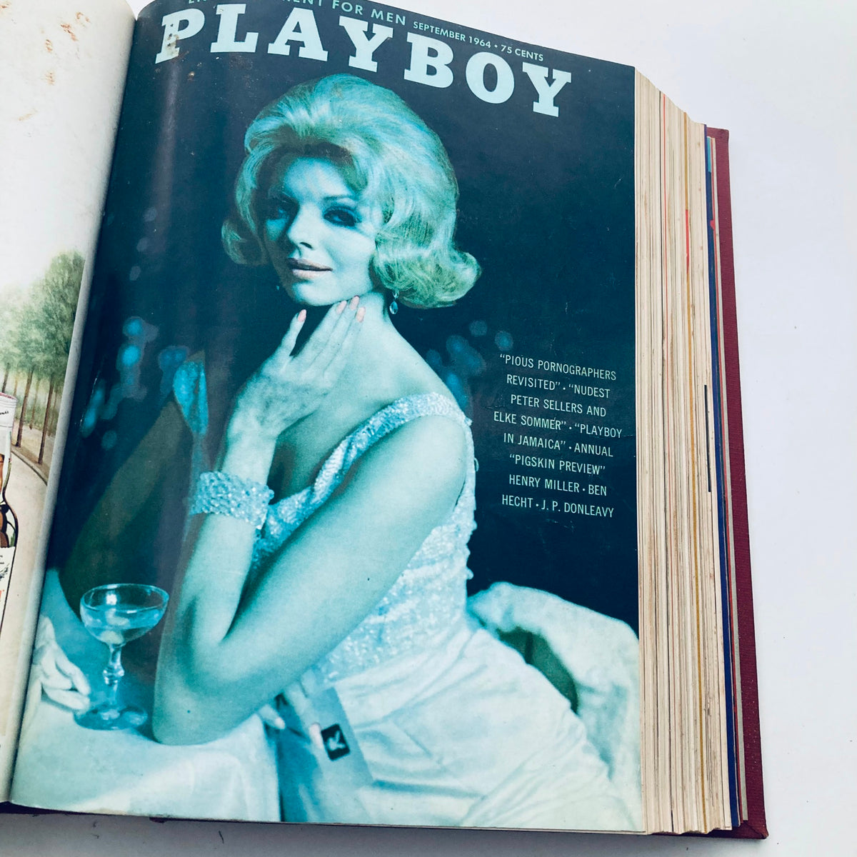 Cover page of the Complete 1964 Original Playboy Magazine, September issue featuring a glamorous woman with 1960s hairstyle and sparkling attire.