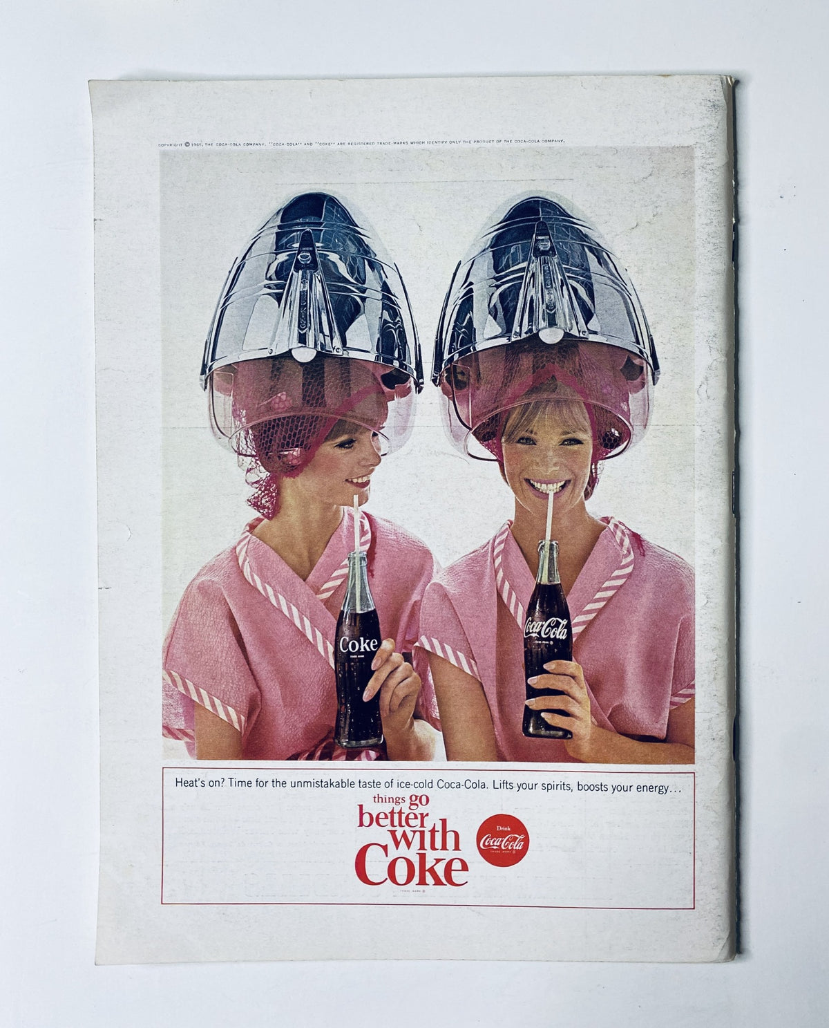 The New Yorker Magazine January 30, 1965 Dinner Party Cover Art by Peter Arno, featuring an advertisement for Coca-Cola with two women in pink hairdryers, promoting 'Things Go Better with Coke'.