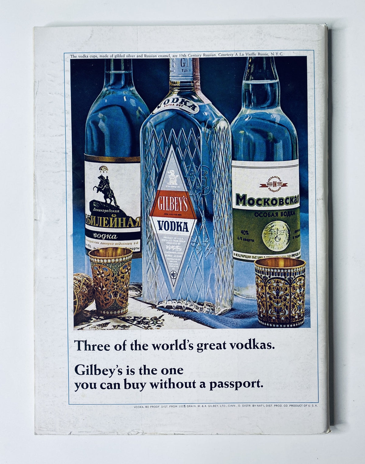 Back cover of The New Yorker Magazine November 12, 1966 featuring an advertisement for Gilbey's Vodka with three vodka bottles and elegant glassware.