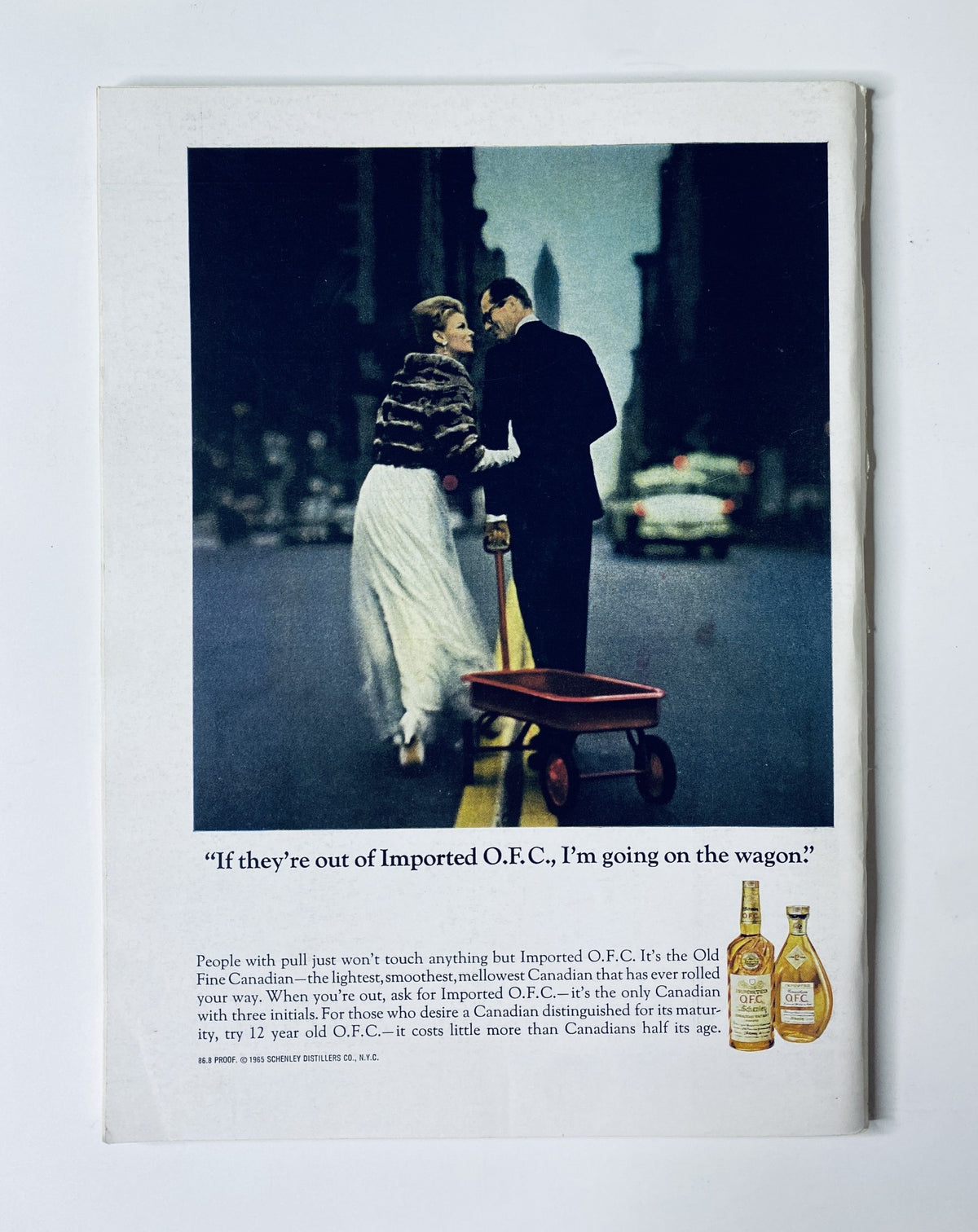 Vintage advertisement from The New Yorker Magazine April 9, 1966, featuring a couple in formal attire, with text discussing Imported O.F.C. whiskey, showcasing a nostalgic representation of mid-20th century fashion and lifestyle.